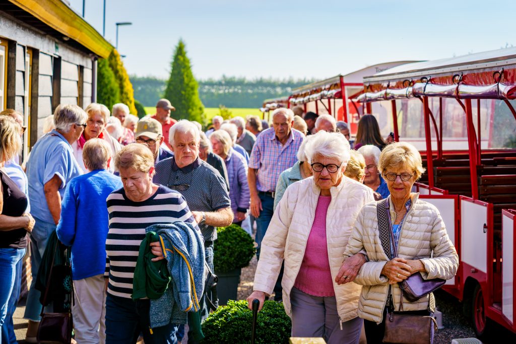 deelnemers stappen in bij het eerste ophaalpunt